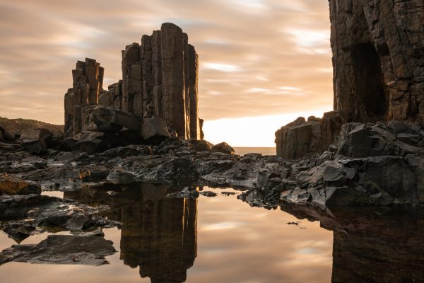 Golden hour long exposure with basalt columns