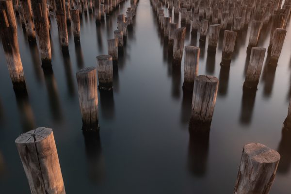 Burnt down wooden pier
