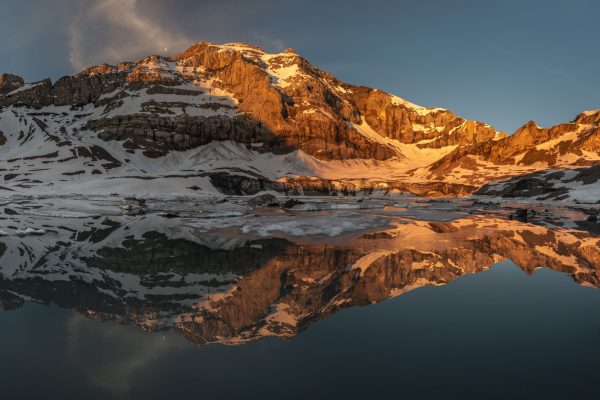 Glacial Lake Reflecting Sunrise Alpenglow