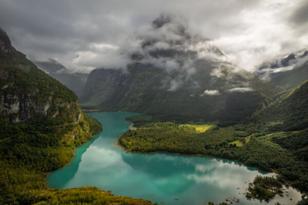 Turquoise Lake in Front of Misty Mountain